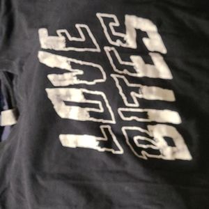 Black t-shirt with "love bites". Def Leppard band theme